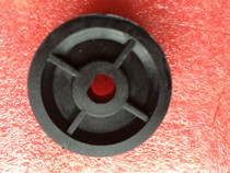 A large belt pulley for the accessories of the money counter