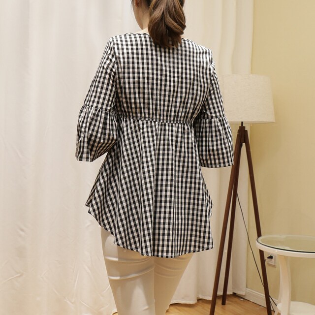 Black and white cropped plaid shirt with short front and long back