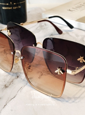 2023新品无框气质女圆脸墨镜