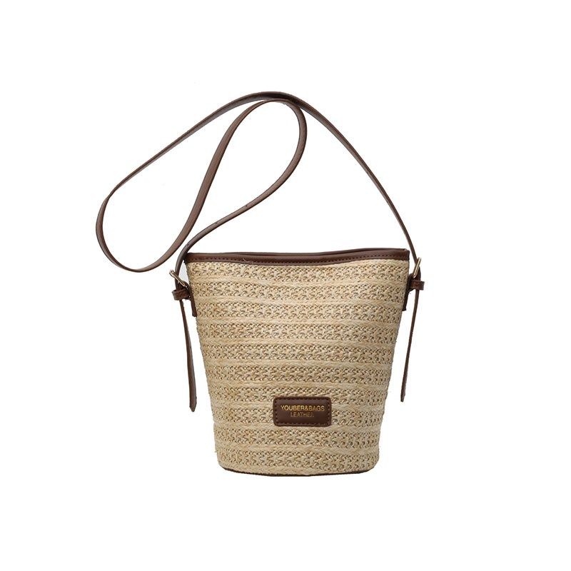 夏天编织草编包包女2025新款海边度假沙滩包百搭小众斜挎包水桶包,淘宝优惠券,粉丝福利购,淘宝优惠卷