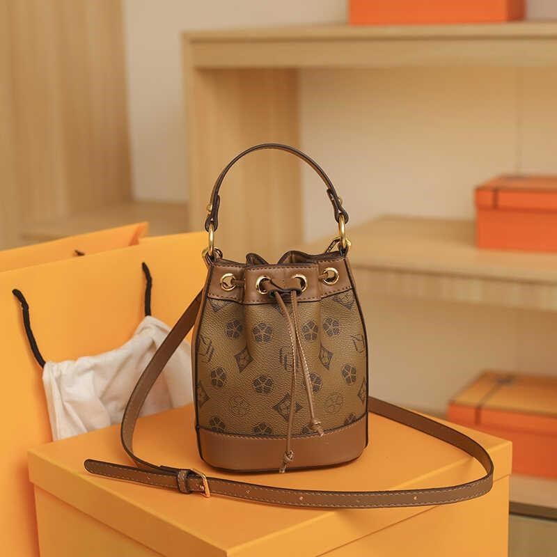 网红款迷你小水桶包2025新款女包时尚百搭手提老花包单肩斜挎小包,淘宝优惠券,粉丝福利购,淘宝优惠卷