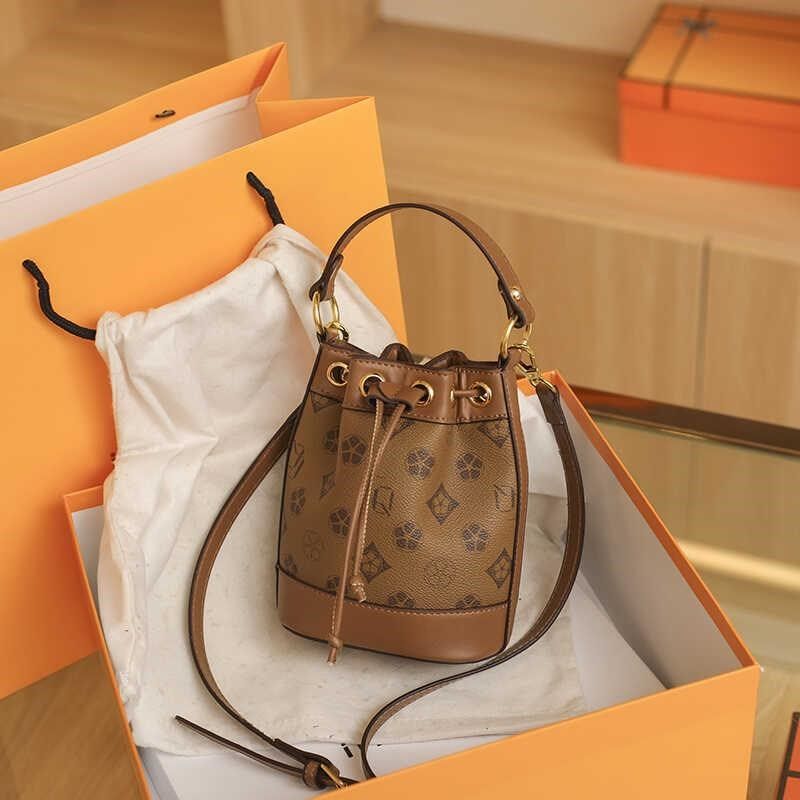 网红款迷你小水桶包2025新款女包时尚百搭手提老花包单肩斜挎小包,淘宝优惠券,粉丝福利购,淘宝优惠卷