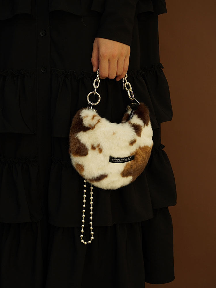 HIDDENNOTES/原创 奶牛纹毛绒腋下包 2用辣妹手机包 月亮型链条包,淘宝优惠券,粉丝福利购,淘宝优惠卷