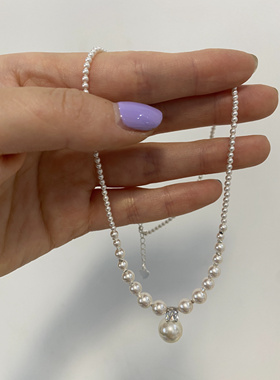 闪了施家强光珍珠项链哦