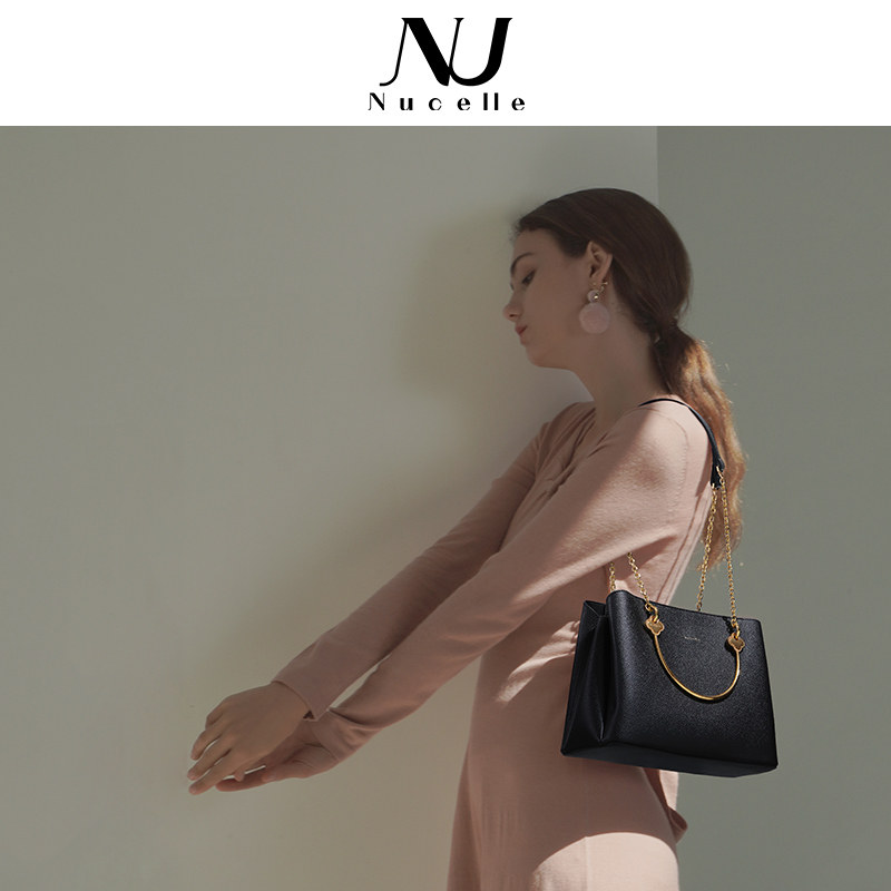 纽芝兰白色女士2022新款高级手提包 纽芝兰箱包女士包袋