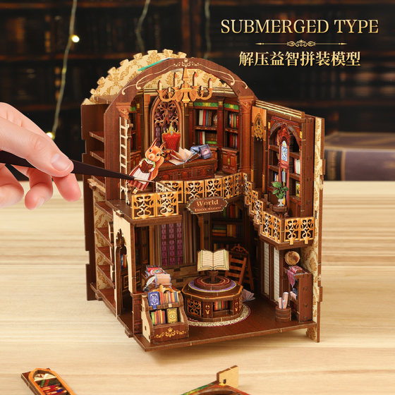 DIY hand-assembled 3D mini bookend house