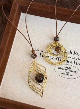 美拉德金色虎眼石长款吊坠项链女款秋冬轻奢高级感毛衣链装饰配饰