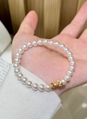 深圳旭佳旭家暖白正圆施家珍珠金色国风螺丝扣手链女气质时尚经典