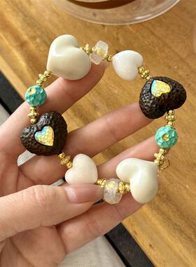 天然象牙果屁桃牛骨爱心沉香镶嵌爱心白水晶跑环菱镁矿爱心珠子