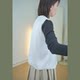 ເສື້ອຢືດ cardigan ສີຂາວຈັບໃຈ