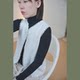 ເສື້ອຢືດ cardigan ສີຂາວຈັບໃຈ