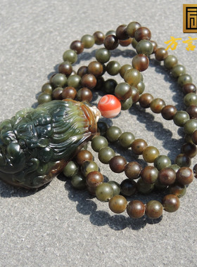 新疆黄沁皮沙枣青籽料特色黄财神