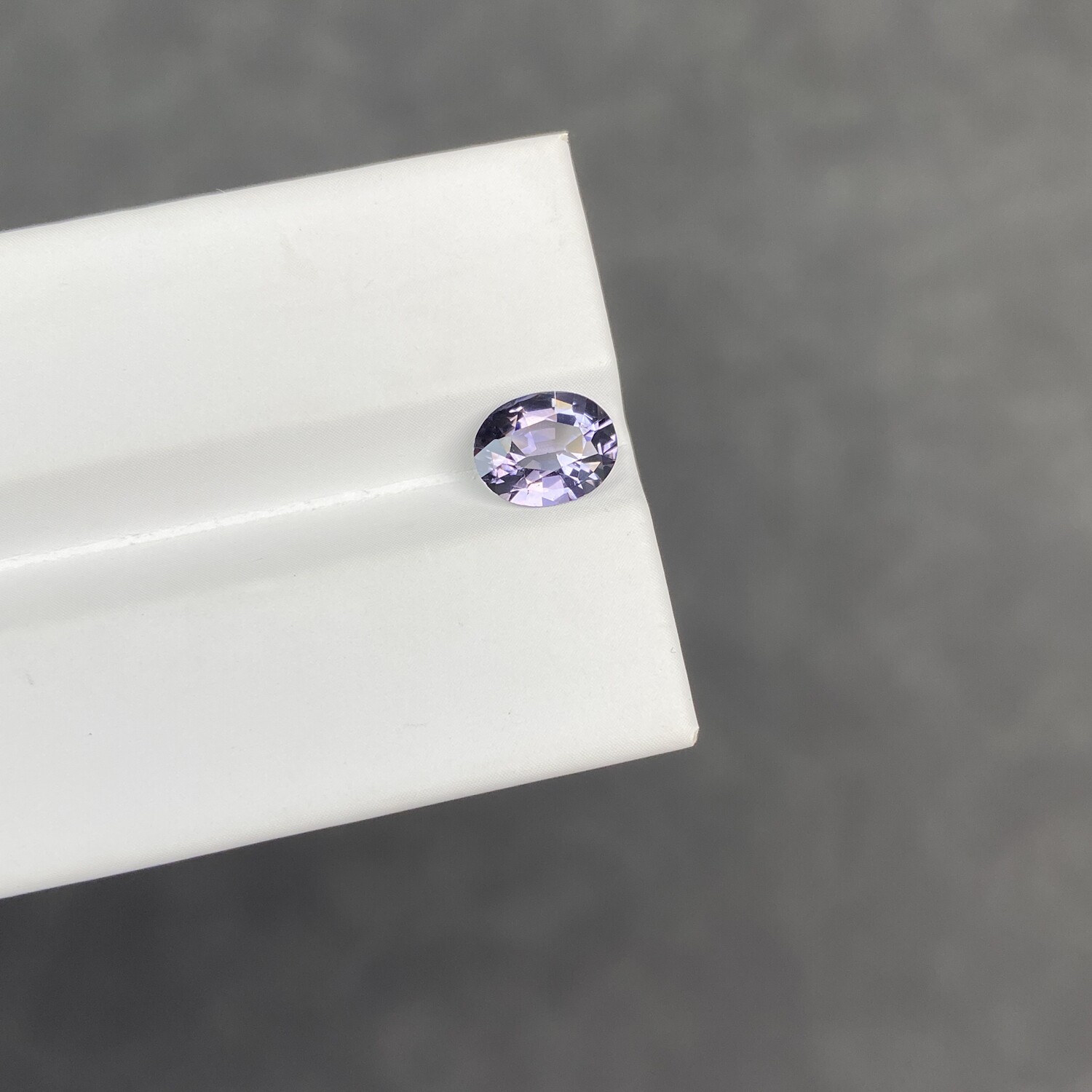 1.6 carat natural metallic purple spinel oval