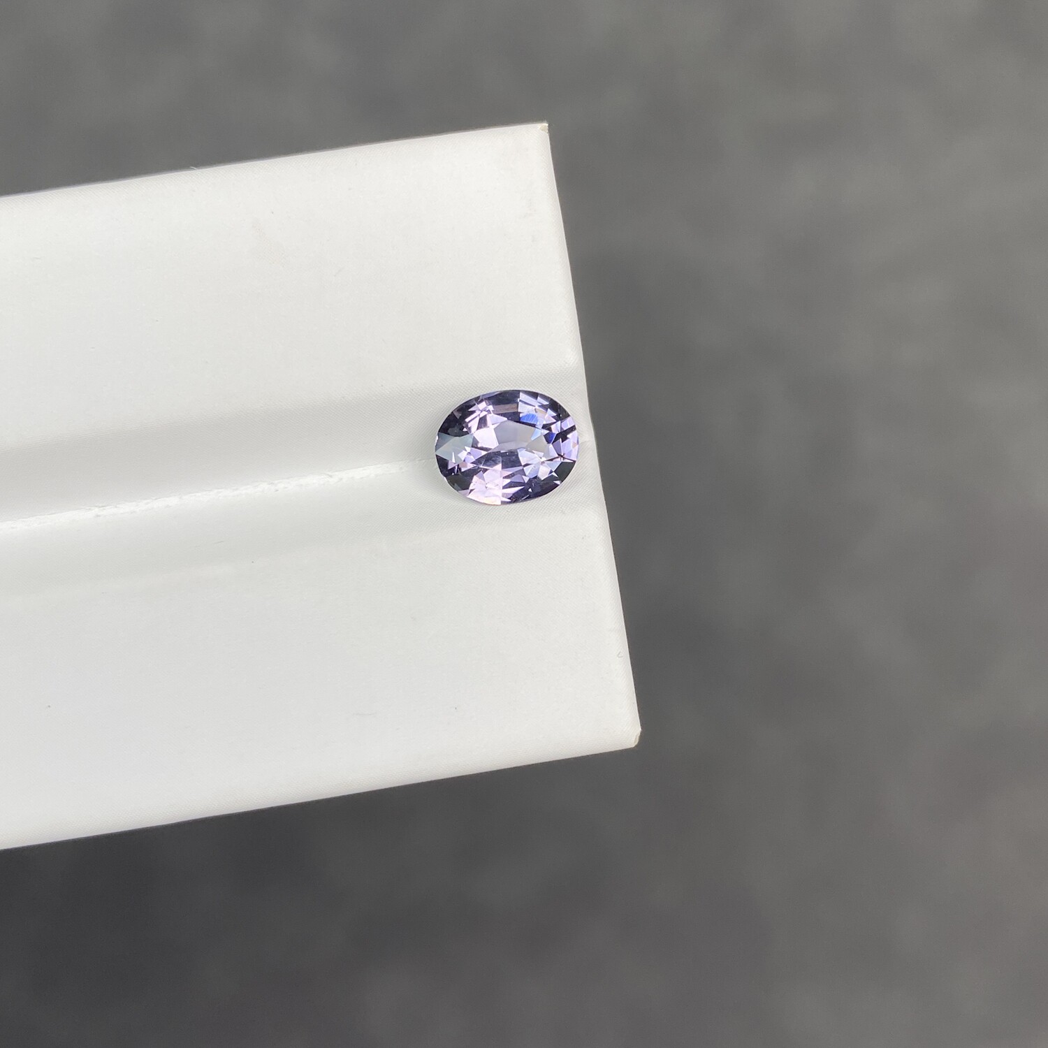 1.6 carat natural metallic purple spinel oval