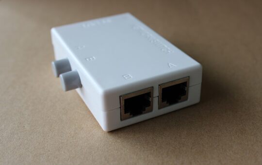Rj45 two-port network switch sharing device inside and outside