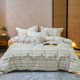 Light luxury buttons A type of cotton jacquard literary style four-piece set cotton double-layer wrinkled quilt cover bed sheet style