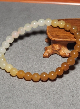 新疆的猫L102902 9.1克直径6mm色调油亮冰润且末糖白玉渐变手链