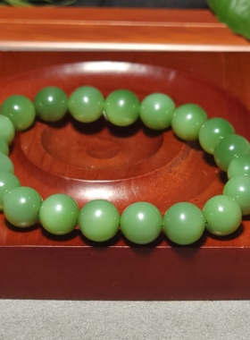 L122704 25.1克，直径9.5mm色调鲜艳肉质纯净的碧玉粉绿圆珠手链