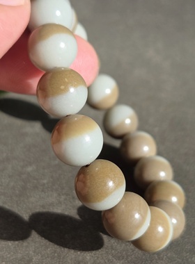 新疆的猫W121804 43.11克，泛蓝熟肉聚半糖的聚宝盆手串