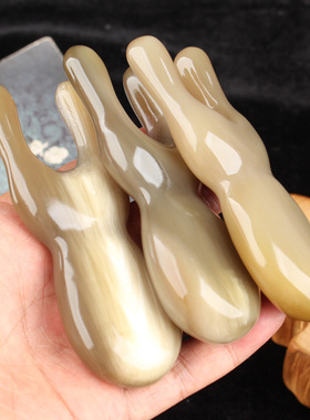 壮姑娘牛角鼻刮眼部按摩器