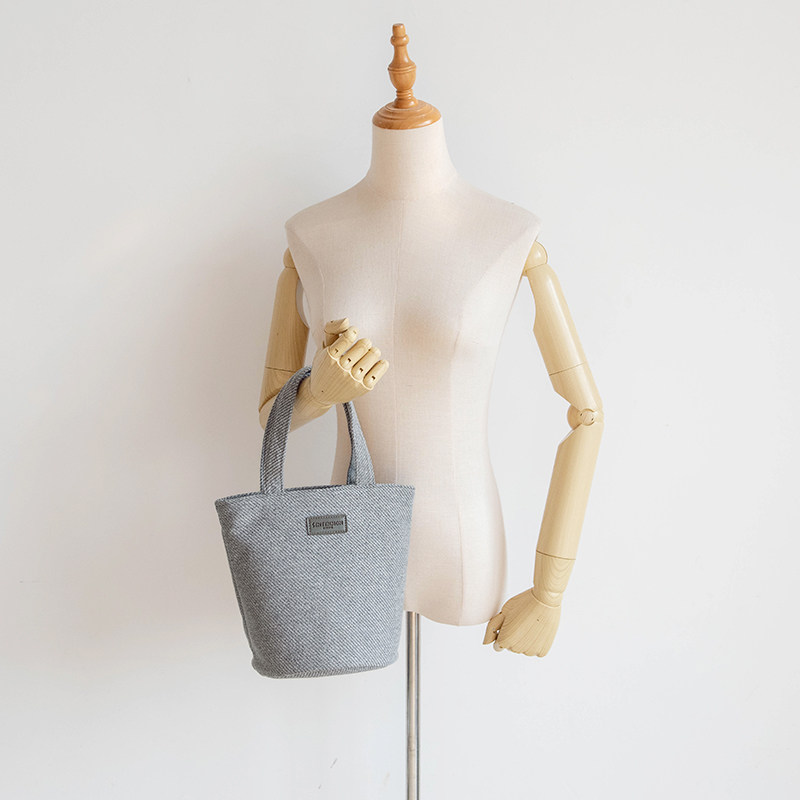 水桶手提包2025新款女包麻布纹简约布包上班小拎包休闲圆筒手拎包