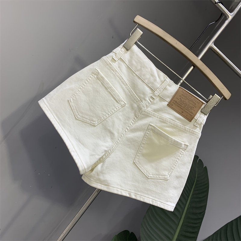 韩版2025春夏新款米杏色前裙后裤牛仔a字裙高腰弹力不同排扣短裤,淘宝优惠券,粉丝福利购,淘宝优惠卷