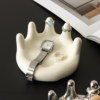 Creative palm tray ornaments, high-end niche ceramic jewelry ring storage, entrance key desktop storage rack
