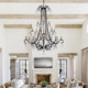 American duplex staircase villa with large chandelier in the living room