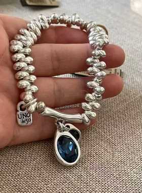 Unode50复古碎银挂锁蓝水晶手链