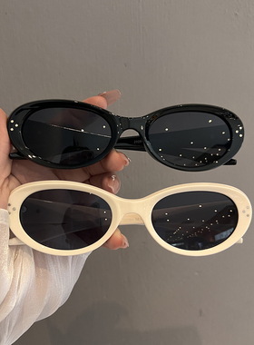 高级感复古椭圆米白框gm墨镜女