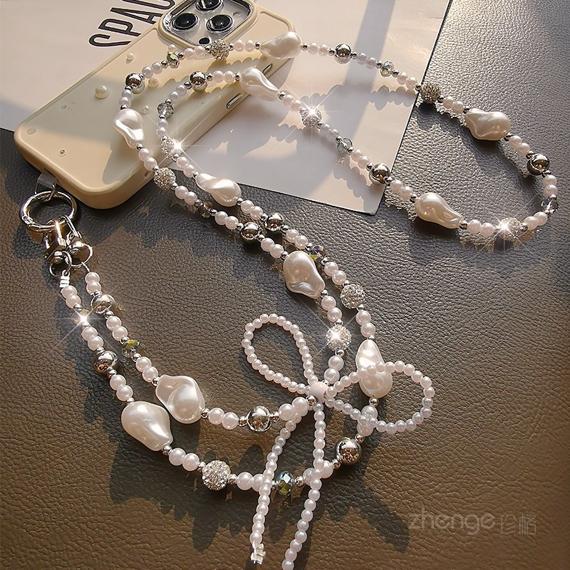 斜挎蝴蝶结珍珠手机挂链ins时尚女士户外手机挂绳旅游出行逛街小香风好看巴洛克手机壳高端可背链新款,淘宝优惠券,粉丝福利购,淘宝优惠卷
