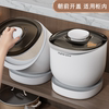 The rice bucket in the cupboard faces forward to scoop rice without fear of hitting the top.