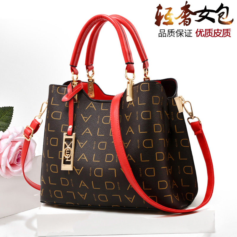 女2020新款时尚百搭中年流行手提包 mrorgbr女士包袋