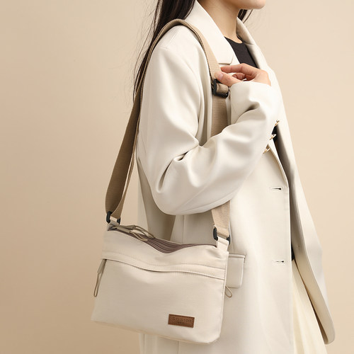 2024新多层斜挎包休闲百搭多口袋便携布包防泼水单肩女包轻便小包 - 图1