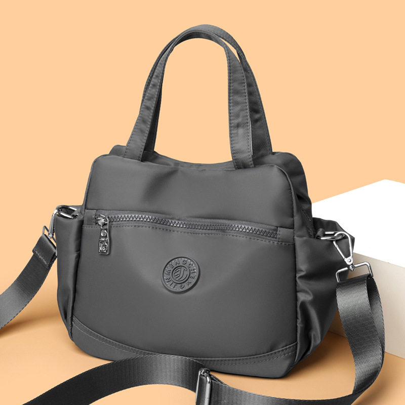 2026新款单肩斜挎包女大容量多口袋牛津帆布通勤上班杂物手提小包,淘宝优惠券,粉丝福利购,淘宝优惠卷