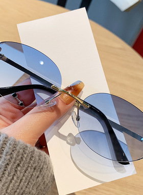 2025新款字母小框椭圆形大红色太阳镜欧美无框墨镜个性防紫外线潮