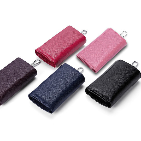 Llavero de piel auténtica con tarjetero multifunción para cambio.