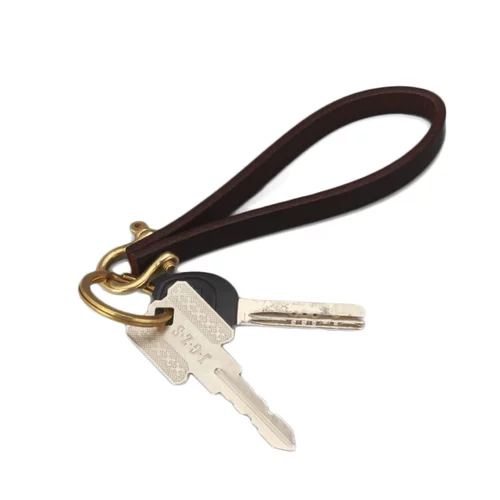 Кожаный ретро универсальный брелок ручной работы для ключей с застежкой, из натуральной кожи, воловья кожа, простой и элегантный дизайн