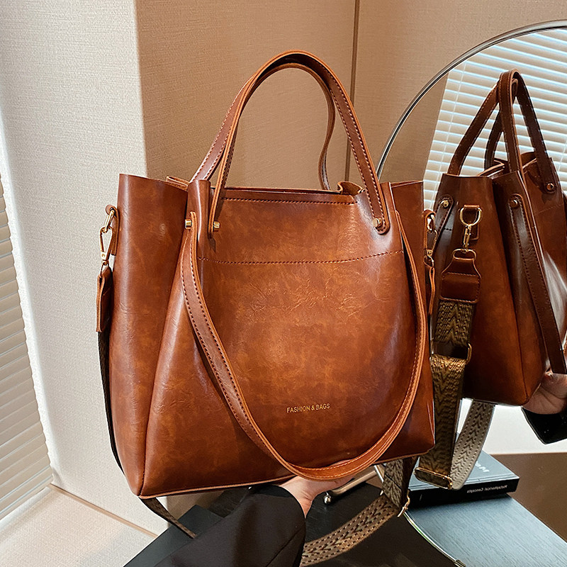 春夏新款大容量手提包包女2025复古单肩腋下包复古通勤斜挎水桶包,淘宝优惠券,粉丝福利购,淘宝优惠卷