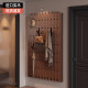 Hole-free solid wood piano key hanger on entry wall