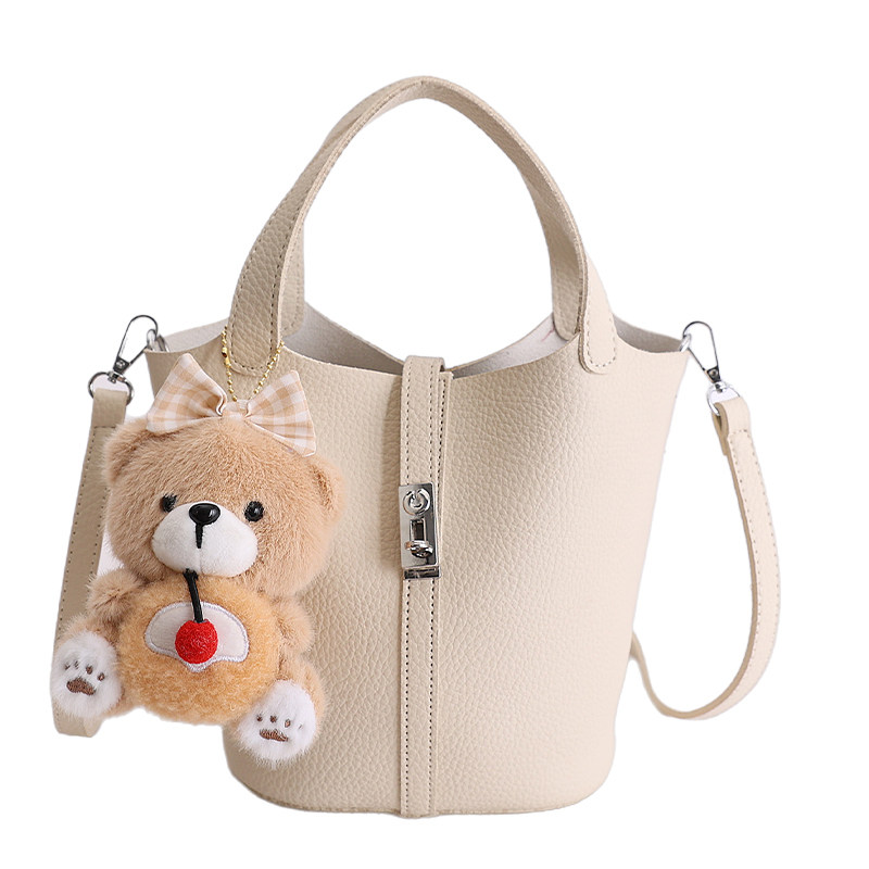 今年流行小众精致通勤水桶包包女日系小清新手拎包时尚单肩斜挎包,淘宝优惠券,粉丝福利购,淘宝优惠卷