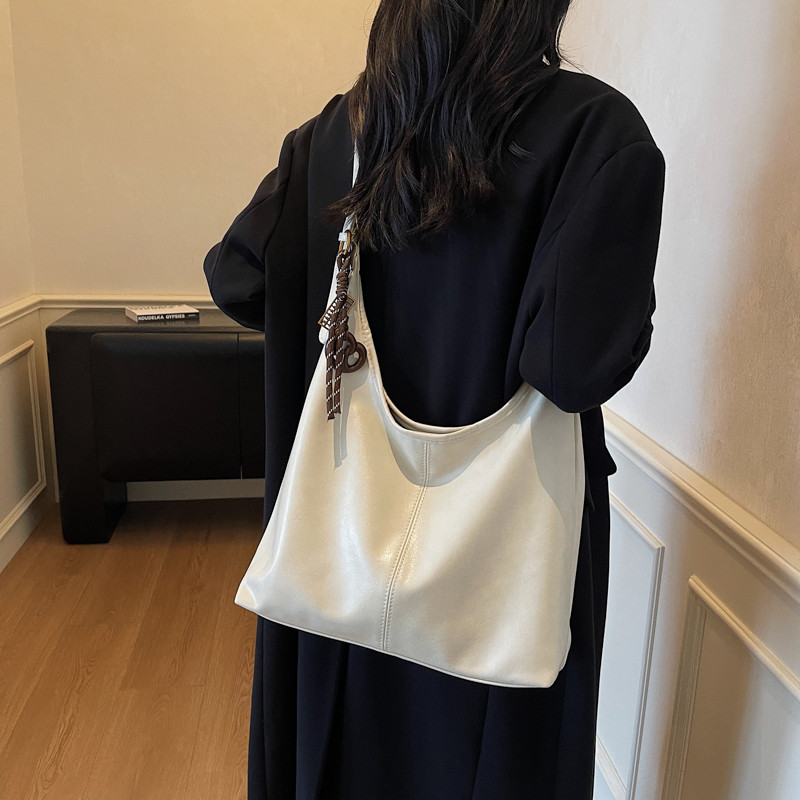 今年流行小众高级感托特包复古软皮通勤单肩包森系大容量斜挎包女 - 图1