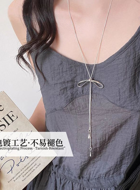 MIU系蝴蝶结金属项链女长款气质百搭毛衣链2026新款轻奢高级配饰