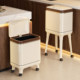 Tall kitchen waste bin that requires no bending