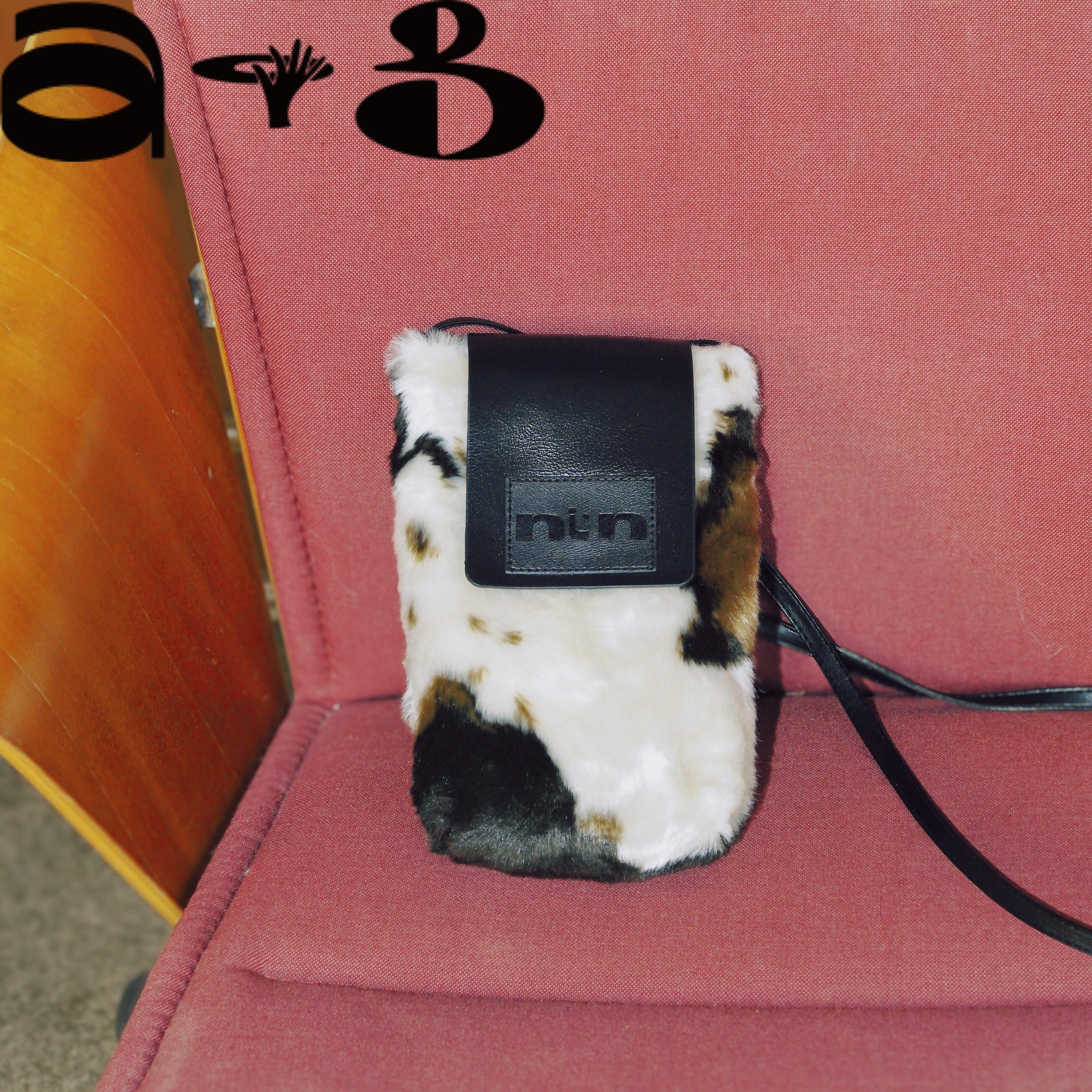 ALLGOODGOODS nin奶牛纹马毛真皮竖款手机包复古小众斜挎迷你包,淘宝优惠券,粉丝福利购,淘宝优惠卷