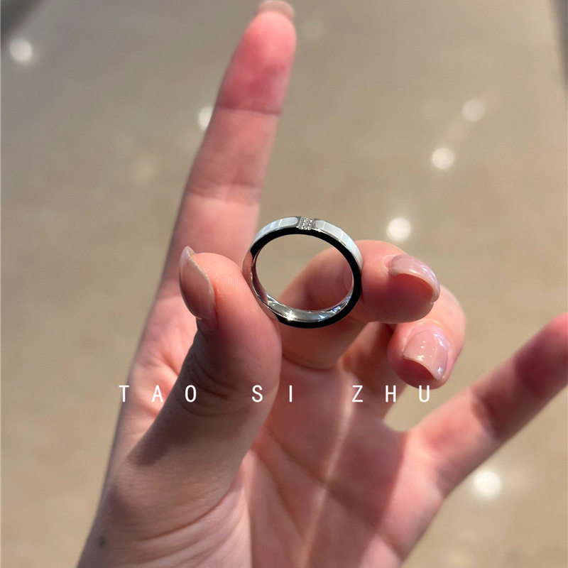 Titanium steel colorless white fritillary ring niche design high-end diamond inlay exquisite fashionable elegant plain ring ring versatile