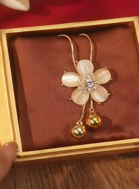 气质温柔猫眼石花朵流苏毛衣链秋冬新款时尚百搭长款可调节项链女