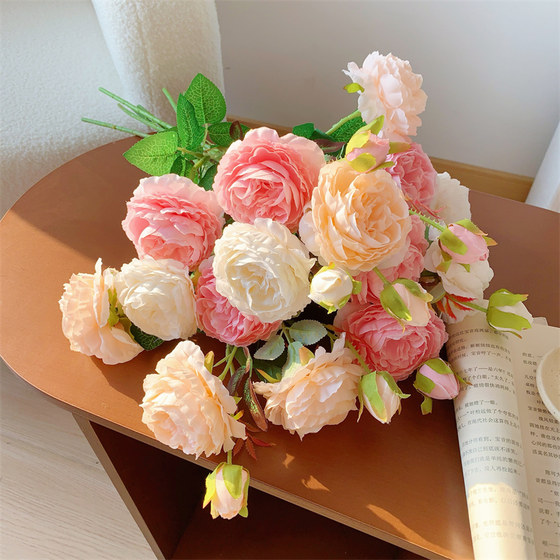 Simulated roses and fake flower bouquet decorations