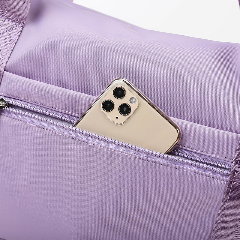 手提旅行包女短途可套大容量拉杆箱 tteoobl狂野周末旅行袋