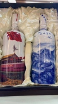 Ceramic wine bottle collection 8899 wine cabinet showing the Chinese Dream Two catties beautifully intact a pair of wine bottle gift boxes